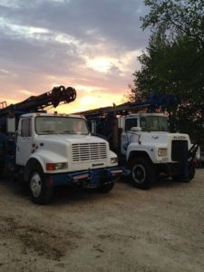 Two Prairie State Water trucks driven by Illinois licensed water well drillers